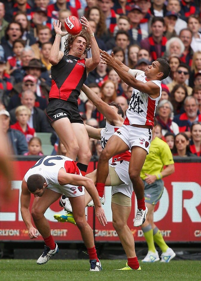 AFL 2016 Rd 02 - Melbourne v Essendon MELBOURNE, AUSTRALIA - APRIL 2: Joe Daniher of the Bombers marks during the 2016 AFL Round 02 match between the Melbourne Demons and the Essendon Bombers at the Melbourne Cricket Ground, Melbourne on April 2, 2016. (Photo by Sean Garnsworthy/AFL Media)